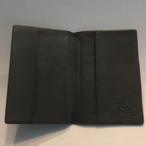 Leather passport holder.